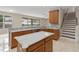 Well-equipped kitchen with modern appliances, marble counter tops and island at 10068 Chardonnay Dr, Orlando, FL 32832
