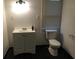 Bathroom with toilet, and vanity with storage at 112 Edwards St, Daytona Beach, FL 32117