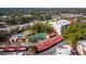 Aerial view of community with pool, tennis courts, and residential buildings at 1150 Carmel Cir # 503, Casselberry, FL 32707