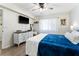 Comfortable bedroom with stylish dresser, wood-look floors, and a ceiling fan at 1150 Carmel Cir # 503, Casselberry, FL 32707