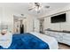 Bedroom with wood-look floors, ceiling fan and ensuite bath/toilet at 1150 Carmel Cir # 503, Casselberry, FL 32707