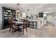 Cozy dining area with kitchen and white cabinets at 1150 Carmel Cir # 503, Casselberry, FL 32707