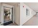 Bright condo entrance with tiled floors, and a view into the living area at 1150 Carmel Cir # 503, Casselberry, FL 32707