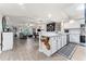 Open floor plan showcasing a seamless flow between the living room and kitchen area at 1150 Carmel Cir # 503, Casselberry, FL 32707
