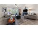 Cozy living room features natural light and comfortable seating at 1150 Carmel Cir # 503, Casselberry, FL 32707