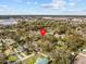Wide aerial shot of the neighborhood with a convenient location pin to easily find the property at 130 Mandrake St, Orlando, FL 32811