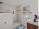 Modern bathroom featuring a glass-enclosed shower and sleek vanity with stylish fixtures at 130 Mandrake St, Orlando, FL 32811