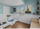 Well-lit office space features a work area, comfortable daybed, and ample storage at 130 Mandrake St, Orlando, FL 32811