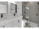 Contemporary bathroom with double sink vanity, quartz countertops and walk-in shower at 15657 Sw 37Th Cir, Ocala, FL 34473