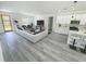 Spacious open floor plan combining living, dining, and kitchen areas, perfect for entertaining at 15657 Sw 37Th Cir, Ocala, FL 34473