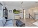 Open living room features modern flooring, and easy access to other areas of the house at 15732 Shorebird Ln, Winter Garden, FL 34787