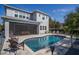 Beautiful kidney shaped pool with a screened patio dining area, as well as lounge seating on a paver patio at 15732 Shorebird Ln, Winter Garden, FL 34787