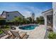 The backyard boasts a refreshing pool with a spacious patio, perfect for relaxation and outdoor gatherings at 15732 Shorebird Ln, Winter Garden, FL 34787