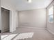 Neutral bedroom with carpet, natural light, and a walk-in closet at 15863 Citrus Grove Loop, Winter Garden, FL 34787