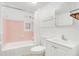 Bathroom with a shower-tub combo and a vanity sink at 1604 Roosevelt Ave, Orlando, FL 32804