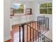 Upstairs landing features hardwood floors and built-in shelving at 1604 Roosevelt Ave, Orlando, FL 32804