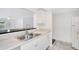 Bright kitchen features a double sink and ample white cabinetry at 1604 Roosevelt Ave, Orlando, FL 32804