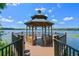 Charming lakefront gazebo with comfortable seating and beautiful water views at 1616 Legacy Park Dr # 1616, Maitland, FL 32751