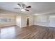 Bright living room featuring hardwood floors, recessed lighting, and ample space for entertaining at 1707 Gammon Ln, Orlando, FL 32811
