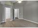 Bedroom with neutral walls and floors, ceiling fan and doorways to other parts of the house at 2243 Davis Dr, New Smyrna Beach, FL 32168