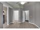 Bedroom with doorways to other parts of the house, featuring a walk-in closet and a shower room at 2243 Davis Dr, New Smyrna Beach, FL 32168