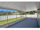 Enjoy the outdoors bug-free in this screened-in porch with an amazing view of the fenced in backyard at 2243 Davis Dr, New Smyrna Beach, FL 32168