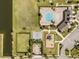 Aerial view of community amenities including pool, playground, basketball court, and parking at 2613 Mead Ave, St Cloud, FL 34771