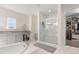 Bright bathroom featuring walk in shower, large soaking tub, and expansive vanity at 2613 Mead Ave, St Cloud, FL 34771