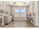 Stylish office featuring a desk, hardwood floors, natural light, and a bedroom view at 2613 Mead Ave, St Cloud, FL 34771