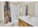 Well-appointed bathroom featuring a single sink vanity, toilet, and a shower-tub combo at 2621 Archfeld Blvd, Kissimmee, FL 34747