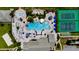 Aerial view of community pools, tennis and basketball courts, and recreation area at 2943 Banana Palm Dr, Kissimmee, FL 34747