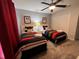 Bedroom with twin beds, ceiling fan, carpet, closet and cool, calm wall color at 2943 Banana Palm Dr, Kissimmee, FL 34747