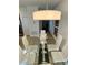 Dining room features a modern glass table with seating for six, perfect for Gathering gatherings at 2943 Banana Palm Dr, Kissimmee, FL 34747
