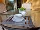 Outdoor dining space with a stylish place setting, perfect for outdoor meals at 2943 Banana Palm Dr, Kissimmee, FL 34747