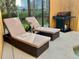 Comfortable patio with lounge chairs and grill, creating the ideal space for outdoor lounging and barbecues at 2943 Banana Palm Dr, Kissimmee, FL 34747
