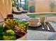 Inviting patio with a beautiful view of the pool and lounge area, perfect for outdoor enjoyment at 2943 Banana Palm Dr, Kissimmee, FL 34747