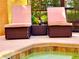 Comfortable patio with lounge chairs and a wine set, creating the perfect setting for relaxation at 2943 Banana Palm Dr, Kissimmee, FL 34747