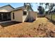 A nice shot of the backyard, featuring a storage shed and lush greenery at 3188 Owassa Ct, Kissimmee, FL 34746