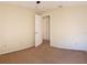 Carpeted bedroom features a closet and neutral paint at 3188 Owassa Ct, Kissimmee, FL 34746