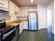 Bright kitchen with stainless steel appliances and ample cabinet space at 3188 Owassa Ct, Kissimmee, FL 34746