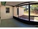 This screened porch offers a view of the backyard at 3188 Owassa Ct, Kissimmee, FL 34746