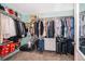 Spacious walk-in closet with ample storage, shelving, and organization, ready for your wardrobe and accessories at 4418 Blackbird St, Kissimmee, FL 34746