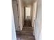 Hallway featuring luxury vinyl plank flooring and white walls at 4903 Lake Ridge Rd # Ge, Orlando, FL 32808