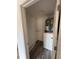 Utility room featuring a newer water heater and luxury vinyl plank flooring at 4903 Lake Ridge Rd # Ge, Orlando, FL 32808