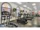 Well-equipped fitness center featuring treadmills and elliptical machines at 569 La Mirage St, Davenport, FL 33897