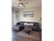Comfortable living room with a sectional sofa and stylish decor at 569 La Mirage St, Davenport, FL 33897