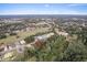 Aerial view of a homesite in a quiet residential neighborhood at 572 Sanctuary Golf Pl, Apopka, FL 32712