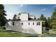 Back of the two-story home showing a view of the neutral colored exterior and roof at 572 Sanctuary Golf Pl, Apopka, FL 32712