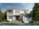 Stunning two-story home showcasing a modern design with a neutral color palette and manicured landscaping at 572 Sanctuary Golf Pl, Apopka, FL 32712