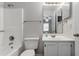 Bathroom features a tub shower, toilet, and vanity with mirror at 6356 Sleepy Hollow Dr, Orlando, FL 32810